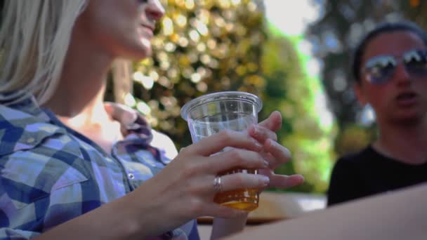 Plastic Cup Beer Close Hand Women Two Friends Sit Park — Stock Video