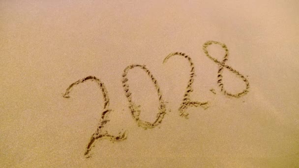 Figures 2028 Golden Sand Beach New Year Eve Concept Top — Stock Video