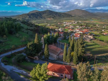 Aerial panoramic view of the picturesque mountainous village of Apidia, Laconia during winter. The village is located in southeastern Greece in Laconia region part of Peloponnese, Greece clipart
