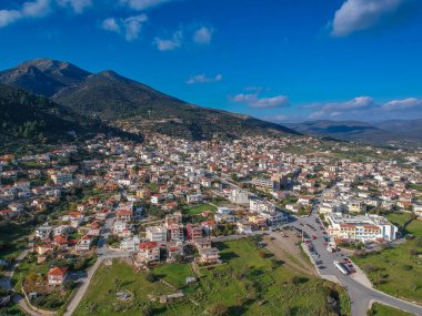Aerial cityscape view of Molaoi town. It is a picturesque mountainous and peaceful town located in Laconia, Peloponnese, Greece. clipart