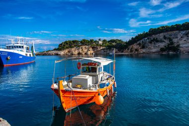 Traditional fishing boats at the picturesque port of Patitiri in Alonnisos island, Sporades, Greece, Mediterranean sea
