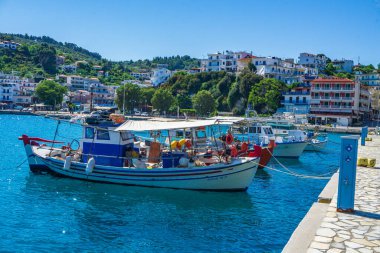 Traditional fishing boats at the picturesque port of Patitiri in Alonnisos island, Sporades, Greece, Mediterranean sea