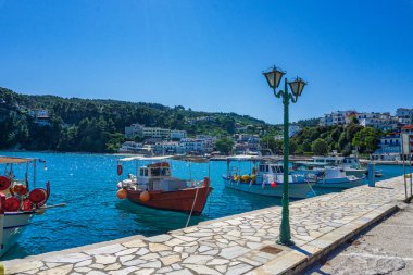 Traditional fishing boats at the picturesque port of Patitiri in Alonnisos island, Sporades, Greece, Mediterranean sea