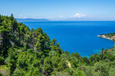 Beautiful natural scenery on the road to Megali Ammos or large sand beach in western Alonissos island, Greece, Europe