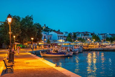 Beautiful seaside view near Skiathos port at sunset. Skiathos, Sporades, Greece.