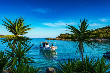 Traditional fishing boats at Steni Vala port the second most populous village on the Greek island of Alonnisos, a picturesque Greek island in Sporades, Aegean Sea, Greece