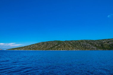 Beautiful seaside view of Peristera island during boating, located near Alonissos, Sporades, Greece