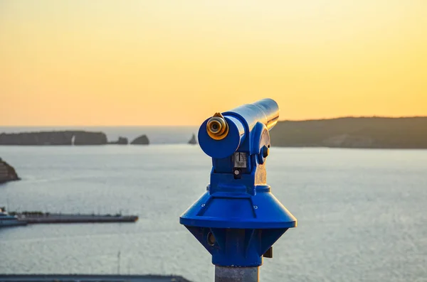Blue Binocular located at the seaside city of Pylos, Greece with a wonderful view towards Navarino gulf at sunset. Pylos, Messenia, Greece