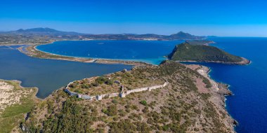 Aerial panoramic view over the ancient venetian castle paleokastro near voidokilia beach in Messenia, Greece, Europe