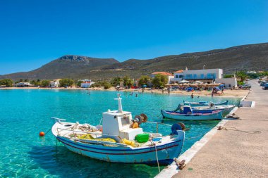 Traditional wooden fishing boats in Diakofti harbor in Kythira island, Greece, Europe