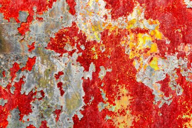 Çatlakları ve çizikleri olan metal bir duvarın dokusu arka plan olarak kullanılabilir.