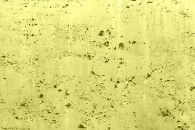 Çatlakları ve çizikleri olan metal bir duvarın dokusu arka plan olarak kullanılabilir.