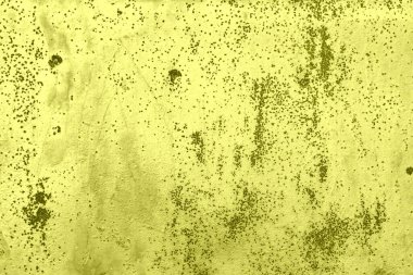 Çatlakları ve çizikleri olan metal bir duvarın dokusu arka plan olarak kullanılabilir.