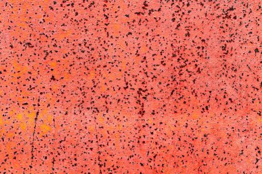 Çatlakları ve çizikleri olan metal bir duvarın dokusu arka plan olarak kullanılabilir.