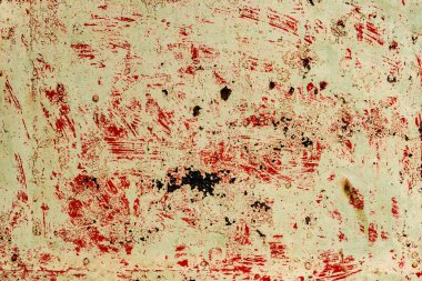 Çatlakları ve çizikleri olan metal bir duvarın dokusu arka plan olarak kullanılabilir.