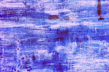 Çatlakları ve çizikleri olan metal bir duvarın dokusu arka plan olarak kullanılabilir.