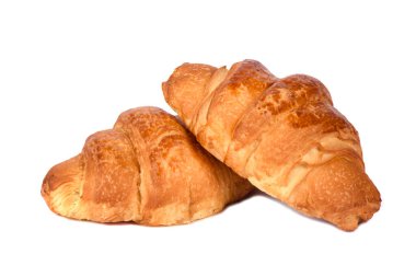 Beyaz arka planda leziz, taze kruvasanlar. Kruvasanlar izole edildi.
