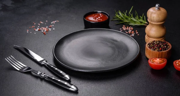 Empty Gray Plate Dark Background Knife Fork — Zdjęcie stockowe