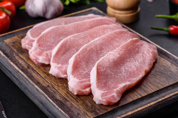 Raw Fresh Pork Meat Sliced Wooden Cutting Board Dark Concrete — Stockfoto