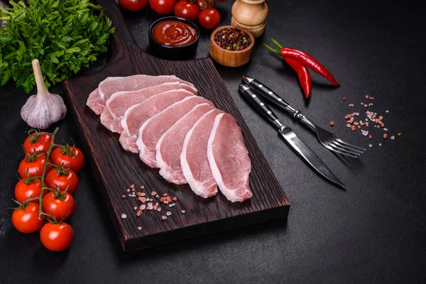 Raw Fresh Pork Meat Sliced Wooden Cutting Board Dark Concrete — Stock fotografie