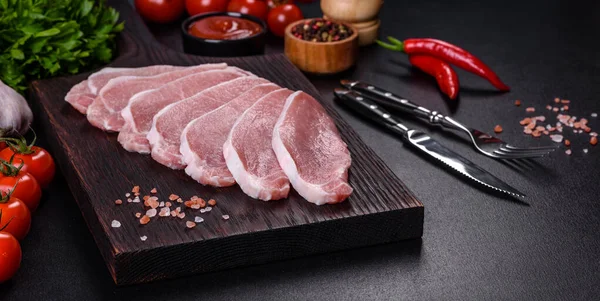 Raw Fresh Pork Meat Sliced Wooden Cutting Board Dark Concrete — Stock fotografie