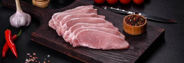 Raw Fresh Pork Meat Sliced Wooden Cutting Board Dark Concrete — Stock fotografie