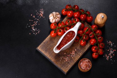 Tomato Sauce on a vintage background as detailed close-up shot
