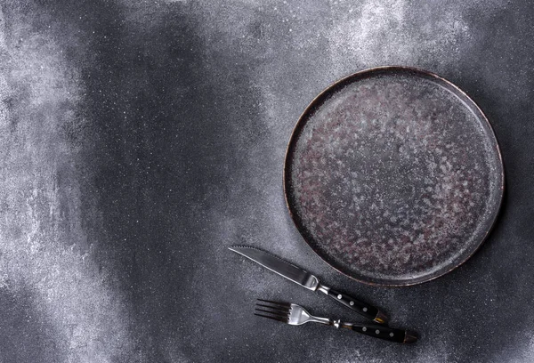 Empty Black Plates Fork Knife Gray Background Top View Copy — Stock Fotó