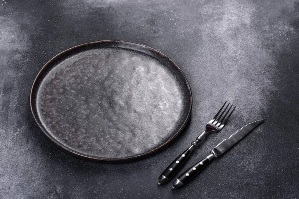 Empty Black Plates Fork Knife Gray Background Top View Copy — Stock Fotó