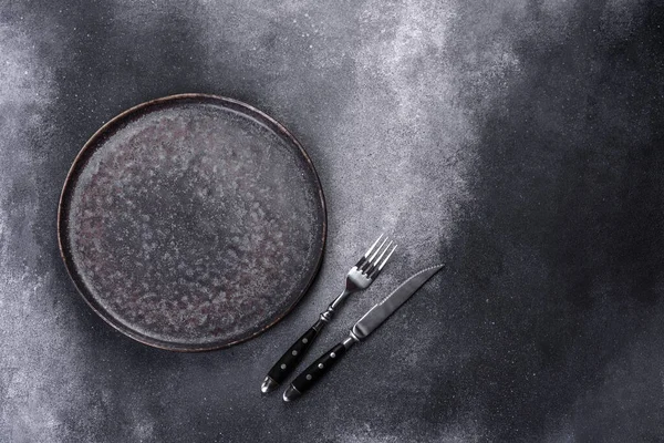 Empty Black Plates Fork Knife Gray Background Top View Copy — Stock Fotó