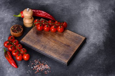 Spicy sweet tomato sauce with garlic, pepper and herbs in a glass jars. Canned tomatoes in tomato juice