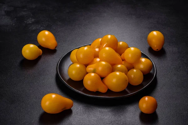 Pear Shaped Small Yellow Tomatoes Ceramic Plate Dark Concrete Table — Fotografia de Stock