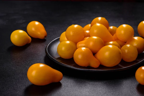 Pear Shaped Small Yellow Tomatoes Ceramic Plate Dark Concrete Table — Fotografia de Stock