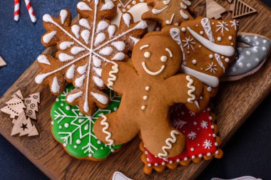 Christmas Decorations with Gingerbread man,fir tree branches and christmas background