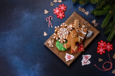 Christmas Decorations with Gingerbread man,fir tree branches and christmas background