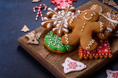 Christmas Decorations with Gingerbread man,fir tree branches and christmas background