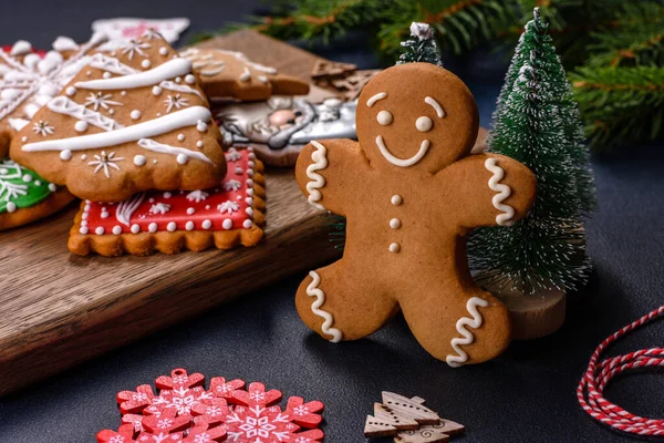 Christmas Decorations with Gingerbread man,fir tree branches and christmas background