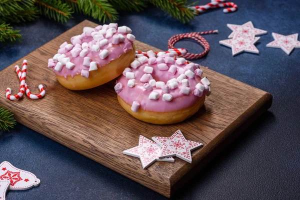 Pink Glazed Doughnut Marshmallow Christmas Decorations Wooden Cutting Board Dark — Stock Photo, Image