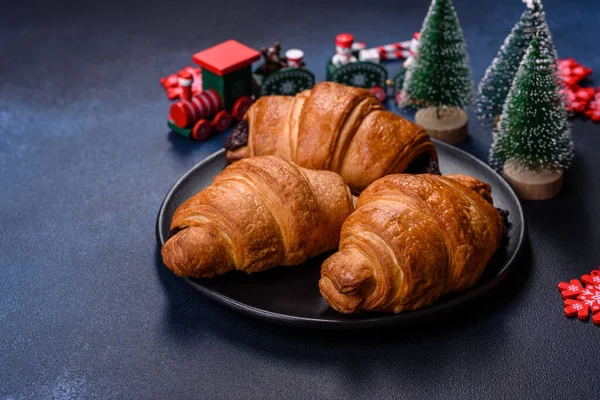 Crispy Chocolate Croissant Christmas Decorations Wooden Cutting Board Dark Concrete — Stockfoto