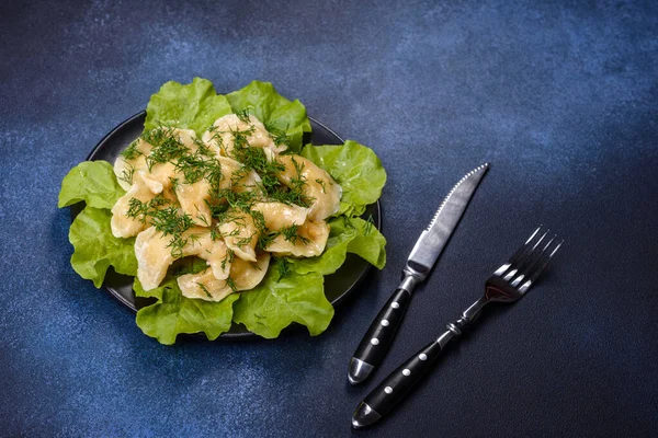Delicious Fresh Cooked Dumplings Potatoes Embellished Greens Lettuce Leaves Dark — Stock Fotó