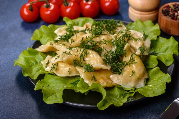 Delicious Fresh Cooked Dumplings Potatoes Embellished Greens Lettuce Leaves Dark — Stok fotoğraf