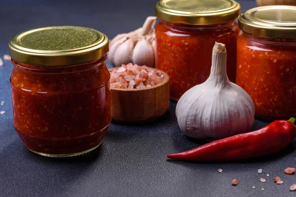 Tomato Chili Sauce Jam Confiture Glass Jar Blue Stone Background — Foto de Stock