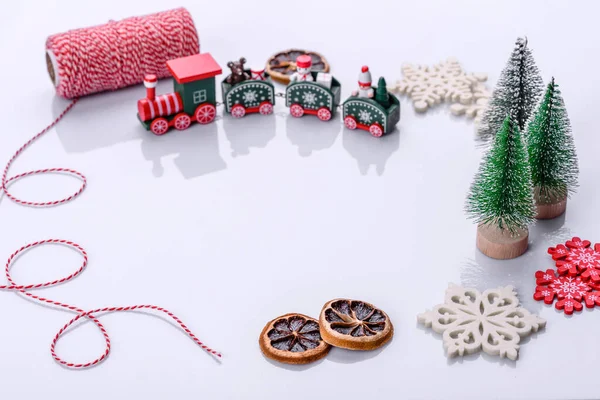 Elements of Christmas scenery, toys, gingerbread and other Christmas tree decorations on a white background. Preparing for the holiday