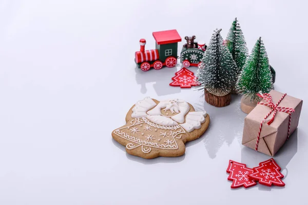 Elements of Christmas scenery, toys, gingerbread and other Christmas tree decorations on a white background. Preparing for the holiday