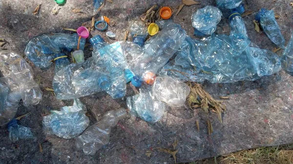 Plastic bottles collected in the sea and stacked for recycling - plastic island in the oceans - climate change and human-caused environmental pollution - green revolution and Save the planet