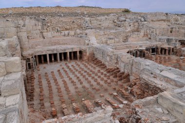 ANCIENT ROMAN BATHS AND RUINS IN KOURION IN CYPRUS clipart