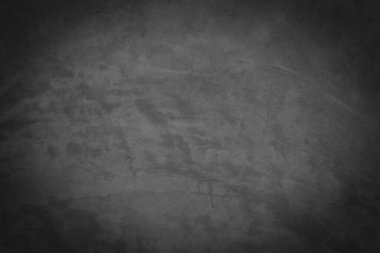 Yüzeyinde çatlaklar olan eski gri beton duvar..