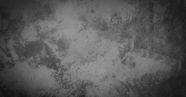 arkaplan duvarı koyu gri çimento.