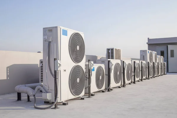 Air conditioner compressor installed outdoor building