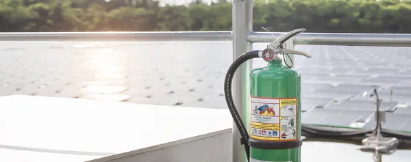 Green Clean Agent Fire Extinguisher With Solar Floating background